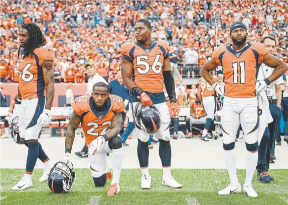  ?? AAron Ontiveroz, The Denver Post ?? Broncos, from left, Trey Marshall, Kareem Jackson, Corey Nelson and Diontae Spencer absorb the Chicago Bears’ winning field goal Sunday.