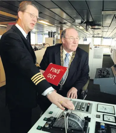  ??  ?? NEW NAME: The Norsea was re-named the Pride of York at King George Dock in 2003, with the Sheriff of York, Cllr. Martin Brumby pictured on the bridge with Captain Jerry Walker.