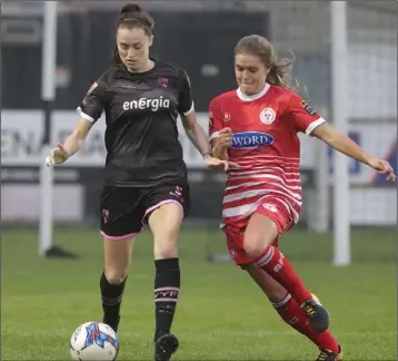  ??  ?? Lauren Dwyer of Wexford Youths is closed down by Jamie Finn (Shelbourne).