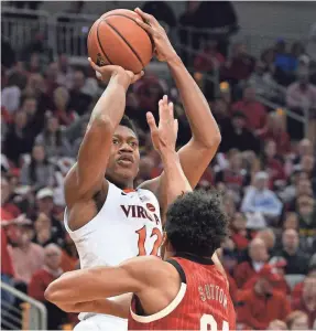  ?? JAMIE RHODES/USA TODAY SPORTS ?? Virginia’s De’Andre Hunter gives coach Tony Bennett a go-to scorer he hasn’t previously had.