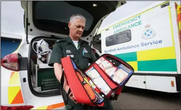  ??  ?? Specialist paramedic Ian Stark with new kit at the Scottish Amulance Service in Edinburgh