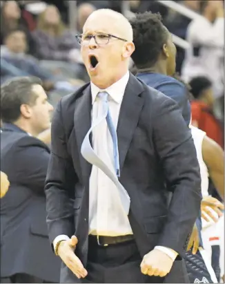  ?? Bill Kostroun / Associated Press ?? UConn coach Dan Hurley reacts during the Saturday’s loss to Florida State in the Never Forget Tribute Classic Newark, N.J.