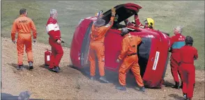  ??  ?? Marshals attend to a Fiesta accident, just one of their many duties at events