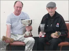  ??  ?? Mick Carty and John Mackey after the 2014 Senior skittler of the year final.