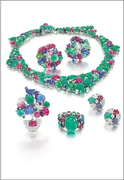  ??  ?? One of the lots - ‘Tutti Frutti’-style jewels; a gem set and diamond wreath of carved rubies, emeralds and sapphires