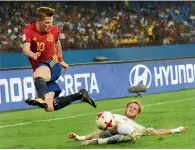  ?? PTI ?? Spanish and Iranian players vie for the ball during their U-17 Fifa World Cup match in Kochi. —