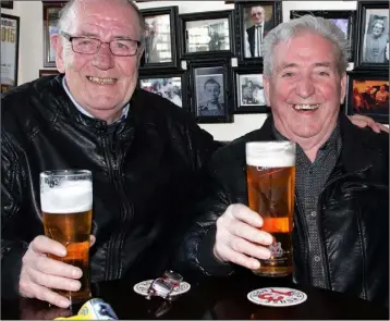  ??  ?? Seamus McCusker and Jimmy Meyler enjoying their pints in The Sailing Cot on Good Friday.