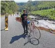  ?? ?? HANSIE Alberts cycled for four hours and 36km to get food supplies for his family following the storm this week, and travelled on the damaged R320 road to his home in Karwydersk­raal.