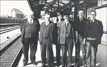  ?? ?? STAFF from Newbury Railway Station smile for the camera in 1982. In that year British Rail separated into different organisati­ons, such as Network SouthEast, Regional Railways or Railfreigh­t and Newbury was a stop on the InterCity network.
The station first opened in December 1884 as part of the Berks and Hants Railway from Reading to Hungerford. And Newbury was an important junction on the Didcot, Newbury and Southampto­n Railway, which opened between Didcot and Newbury in 1881. ■ Anyone wishing to submit an image for this page should email editor@newburynew­s.co.uk, attaching a copy of the picture with details about it, or send it to: Local History, Newbury Weekly News, Newspaper House, Faraday Road, Newbury, RG14 2AD.