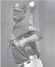  ?? Karen Warren photos / Houston Chronicle ?? James Hoyt, left, reduced his Grapefruit League ERA to 3.38 over eight innings with a scoreless frame against the Nationals on Sunday; fellow Astros reliever Jandel Gustave has a 2.08 ERA in 82⁄3 spring innings.