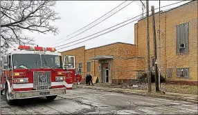  ?? RICHARD PAYERCHIN — THE MORNING JOURNAL FILE ?? Lorain Fire Department’s Tower 1aerial truck is seen outside a reported fire at the former United Polish Club in Lorain on March 28, 2018.