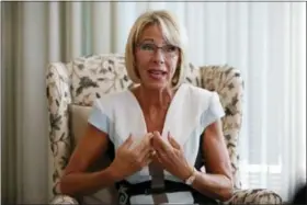  ?? AP PHOTO/JACQUELYN MARTIN ?? In this Aug. 9, 2017, photo, Education Secretary Betsy DeVos is interviewe­d by The Associated Press in her office at the Education Department in Washington. It’s been six months since her bruising Senate confirmati­on battle, and DeVos remains highly...
