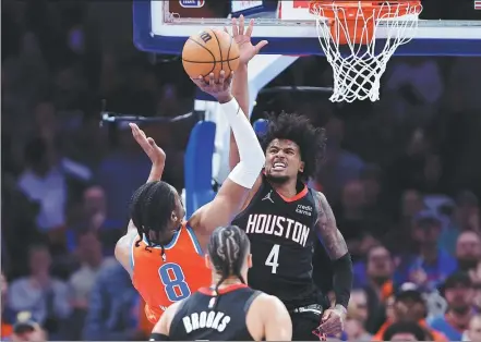  ?? REUTERS ?? Houston Rockets’ Jalen Green attempts to block a shot by the Oklahoma City Thunder’s Jalen Williams on Wednesday.