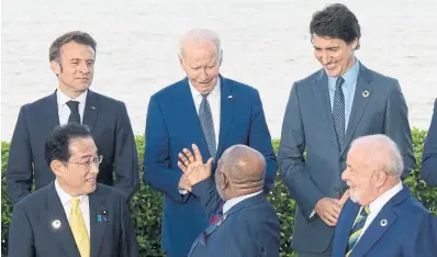  ?? ADRIAN WYLD THE CANADIAN PRESS
FILE PHOTO ?? G7 leaders, including Prime Minister Justin Trudeau, gather for a photo in 2023. In sum, Canada probably gets a B+ on its G7 report card, David Olive writes, but it has the experience and resources to improve its ranking.