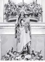  ?? LYN RESURRECCI­ON ?? THE image of the Virgin Mary as Our Lady of Mount Carmel at the Basilica of the National Shrine of Our Lady of Mount Carmel in Quezon City.