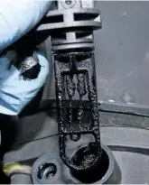  ??  ?? A valuable way to discover the extent of contaminat­ion is to remove and inspect a sensor, should one be mounted to either the throttle body, or intake. The clogged state of this air temperatur­e sensor means that the engine will not be receiving accurate data and that intake cleaning is necessary.