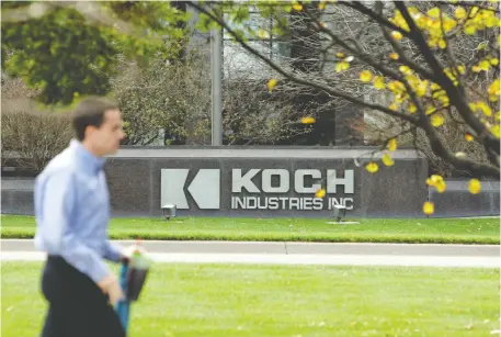  ?? LARRY W. SMITH/BLOOMBERG FILES ?? Wichita-Kan.-based Koch Industries, one of the world’s largest private companies owned by American billionair­es Charles and David Koch, has divested itself of its upstream oilsands holdings and surrendere­d expired leases in the heavy oil play.