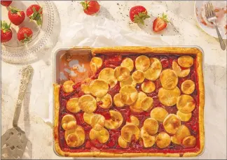  ?? JESSICA EMILY MARX / THE NEW YORK TIMES ?? Red is the symbol of perseveran­ce, making a strawberry slab pie ideal for a Juneteenth gathering.