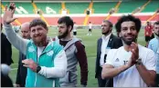  ?? PICTURE: AP ?? Egyptian soccer player and Liverpool’s star striker Mohammed Salah, right, and Chechen regional leader Ramzan Kadyrov, greet fans as they arrive at the Egypt national soccer team training session in Grozny, Russia.