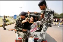  ?? PICTURE: REUTERS/AFRICAN NEWS AGENCY (ANA) ?? Tibetan activists are detained by police during a protest in this March, 2017 file photo to mark the 58th anniversar­y of the Tibetan uprising against Chinese rule outside the Chinese embassy in New Delhi.