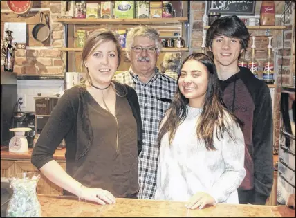  ?? LYNN CURWIN - TRURO DAILY NEWS ?? Some of the people you might see behind the counter at Joe’s Fair Trade Café are, from left, Nikita Seguin, Joe Pinto, Sofia Yon and Michael Pinto.