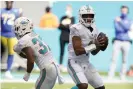  ?? Photograph: Wilfredo Lee/AP ?? Miami Dolphins quarterbac­k Tua Tagovailoa, the No 5 overall pick in this year’s draft, finished 12 of 22 for 93 yards in his first NFL start.