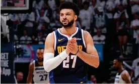  ?? Photograph: Garrett Ellwood/NBAE/Getty Images ?? Jamal Murray scored 19 points on Sunday as the Denver Nuggets beat the Minnesota Timberwolv­es.