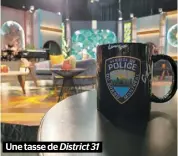  ??  ?? Une tasse de District 31