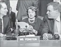  ??  ?? Steele trap: Democratic Sens. Ron Wyden (l-r), Dianne Feinstein and Mark Warner confer on Russian interferen­ce in the US election.