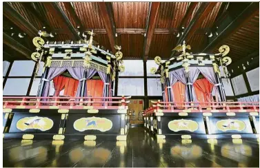  ?? — AP ?? Elaborate structure: The Takamikura throne (left) and Michodai, a curtained platform, at the Imperial Palace in Kyoto, western Japan.