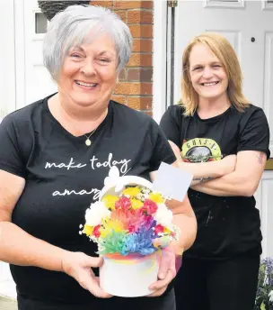  ??  ?? Thanks Tracy McAlonan was delighted to nominate Margaret for the flowers thanks to all her hard work