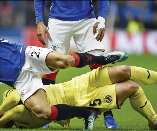  ??  ?? the referee sent off the Rangers winger in a perplexing decision at Ibrox last night to leave the hosts a man down