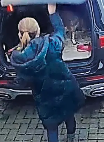  ?? ?? Nicola Bulley was photograph­ed by the doorbell camera at her home in Inskip as she put her dog, Willow, into the back of her car