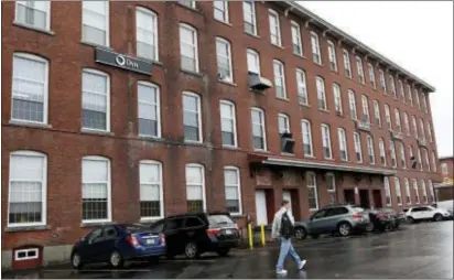  ?? ASSOCIATED PRESS ?? This photo shows Dyn, a New Hampshire internet service company, in the old mill section of the city, Friday, in Manchester, N.H. Cyberattac­ks on a key internet firm repeatedly disrupted the availabili­ty of popular websites across the United States...