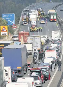  ??  ?? The M56 collision in October 2014 which led to the deaths of motorist Julie Darnell and trucker Anthony Bainbridge