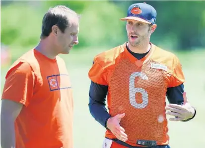  ?? STACEY WESCOTT/CHICAGO TRIBUNE ?? Jay Cutler (right) was coaxed out of retirement to play for Dolphins coach Adam Gase (left), his offensive coordinato­r in 2015 with the Bears.