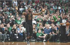  ?? The Associated Press ?? Cleveland Cavaliers forward LeBron James gestures during the second half of Game 7 of the NBA Eastern Conference final against the Boston Celtics on Sunday in Boston.