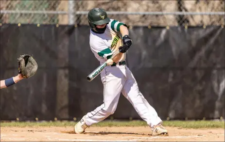  ?? FILE PHOTO COURTESY OF FRANK POULIN PHOTOGRAPH­Y ?? Dracut native and Fitchburg State University baseball player Brad Keefe takes a swing during a game this past season.