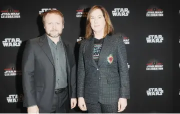  ?? — AFP file photo ?? Director Rian Johnson and Kennedy attend the ‘Star Wars: The Last Jedi’ during the 2017 Star Wars Celebratio­n on Apr 14, 2017 in Orlando, Florida.