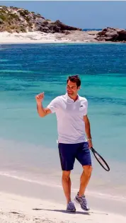  ?? AFP ?? Swiss tennis player Roger Federer walks along a beach at the Rottnest Island off the coast of Western Australia on Thursday. —