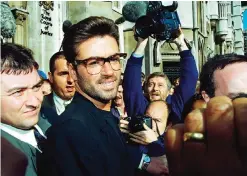  ??  ?? In this Monday, Oct 18, 1993, file photo, pop star George Michael, 30, outside the Royal Courts of Justice in London at the start of his court action against Sony Music Entertainm­ent (UK) Ltd.