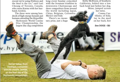  ??  ?? Dorian Valkai, from Denmark, competes with his poodle, Jazmin,
on the final day of the Skyhoundz competitio­n.
