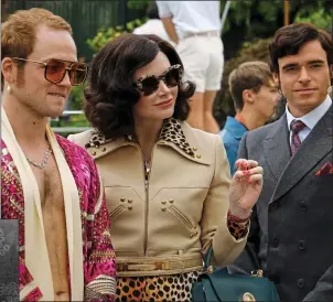  ??  ?? ‘MAKING A MYTH’: Taron Egerton as Elton John, Bryce Dallas Howard as his mother Sheila and Richard Madden as John Reid. Left: Mike Batt in 1975