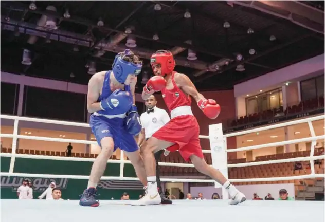  ?? ?? ↑
Boxers in action during their bout at the first Gulf Youth Games.