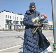  ?? AP Photo/Sharon Johnson ?? Valerie Handy-Carey stands at Donald Lee Hollowell Parkway and Finley Avenue on March 19, 2023, in Atlanta. Several months earlier, her daughter Brittany Glover was hit by a car and died while trying to cross the intersecti­on.