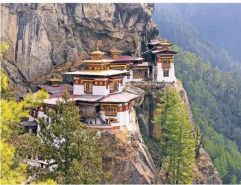  ?? FOTO: DPA ?? Der Himalaya-Staat Bhutan bietet bizarre Sensatione­n auf der Basis buddhistis­cher Einstellun­g.