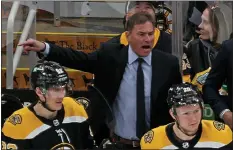  ?? STUART CAHILL / BOSTON HERALD FILE ?? Bruins coach Bruce Cassidy screams at the ref during a game against the Rangers at TD Garden on April 23.