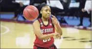  ?? Sean Rayford / Associated Press ?? North Carolina State forward Kayla Jones passes the ball during the first half of the team’s NCAA women’s basketball game against South Carolina on Thursday in Columbia, S.C.