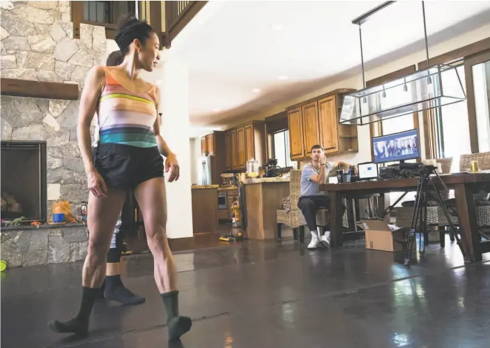  ?? Reneff-Olson Production­s ?? San Francisco Ballet principal Frances Chung looks back as choreograp­her Dwight Rhoden leads the dancers via videoconfe­rence during Tahoe Dance Camp.