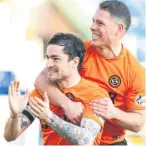  ??  ?? Paul Paton, left, celebrates with John Rankin at the final whistle.